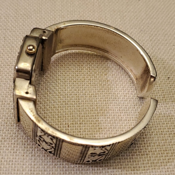Geneva Platinum Wavy Face Ladies Bangle Watch
